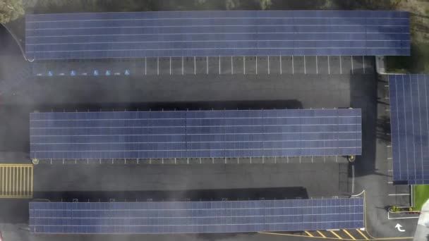 Rising birds eye aerial view, solar panels, morning fog clouds, Los Angeles, Californië — Stockvideo