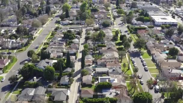 Aerial view over Van Nuys residential city suburb, Los Angeles, California — Stock Video