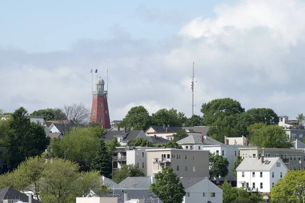 The view of Portland downtown with an observatory built in 1807, the only remaining wooden maritime signal tower in the United States (Maine).