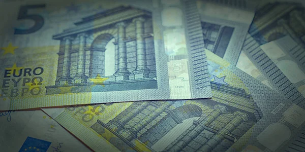 euro banknotes scattered on the surface