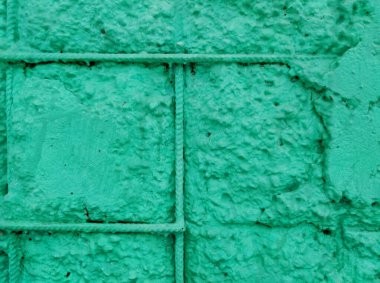 Eski beton bir duvarın dokusu. Makro fotoğrafta şeffaf metal çerçevesi var.