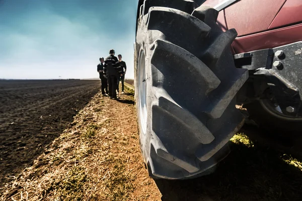 Tractors tire on field — Stock Photo, Image