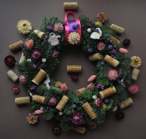 Christmas wreath of spruce and wine corks