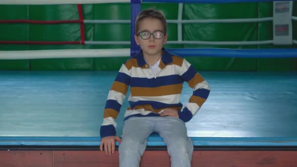 Kid Glasses Sitting Boxing Ring — Stock Video