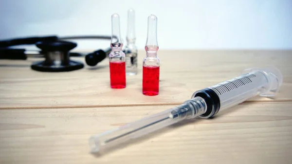 Medical Equipment Seen Image Syringe Syringe Stethoscope Black White Background — Stock Photo, Image