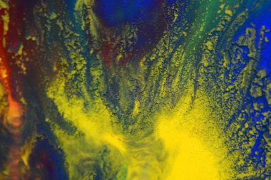 Kırmızı, yeşil, mavi, sarı renkler karışık sıvı makro