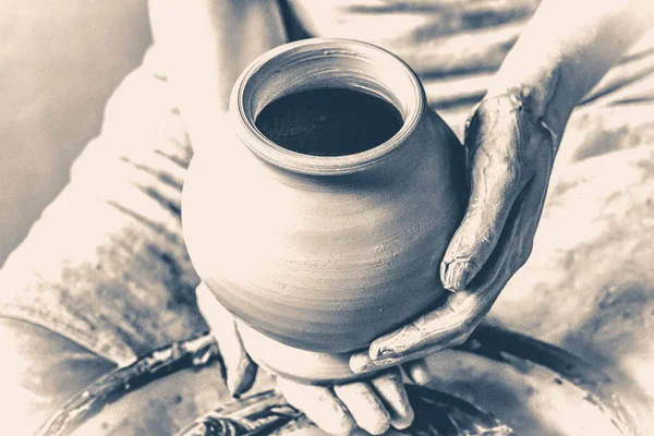 Potter holds more crude to the firing of white clay jug. Old vintage style. — Stock Photo, Image