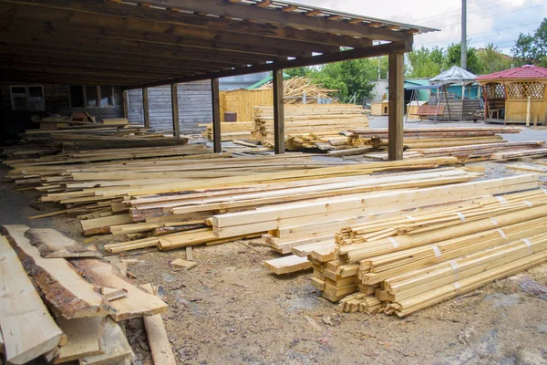 Sawmill. Warehouse for sawing boards on a sawmill outdoors