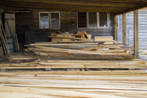 Sawmill. Warehouse for sawing boards on a sawmill outdoors