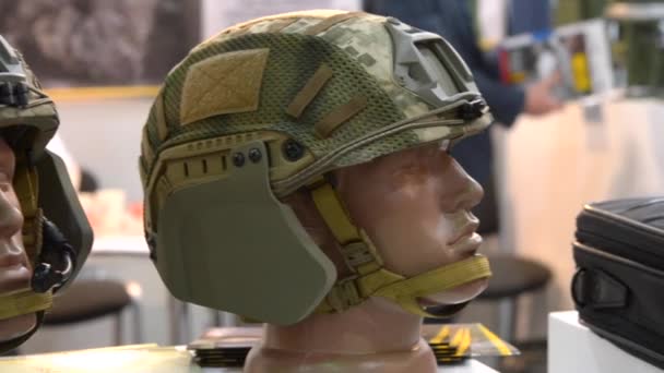 Various body armor and protective helmets — Stock Video