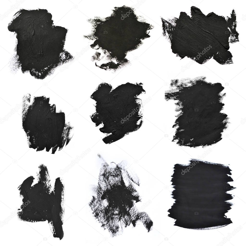 Set black brush strokes on white paper