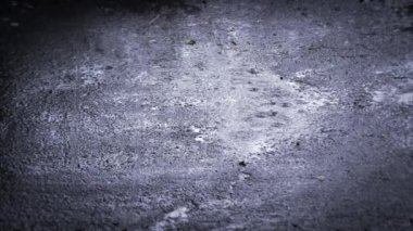 Heavy rain shower downpour cloudburst rainfall behind the glass.