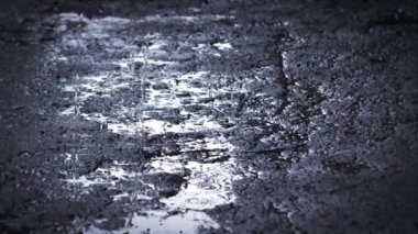 Heavy rain shower downpour cloudburst rainfall behind the glass.