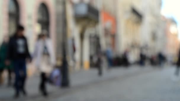 Abstract Defokussierter verschwommener Hintergrund vieler Menschen auf der Straße — Stockvideo