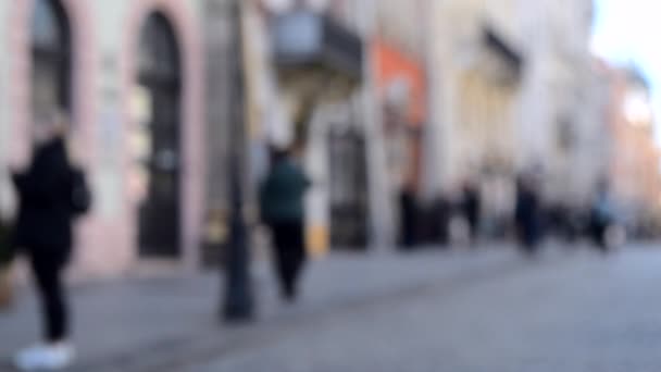 Abstract Defocused Blurred Background of many people on street — Stock Video