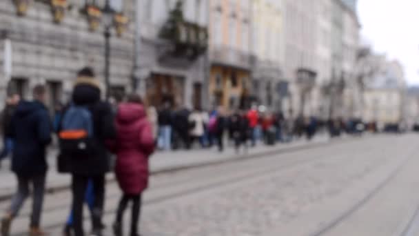 Sammanfattning Oskärpa suddig bakgrund av många människor på gatan — Stockvideo