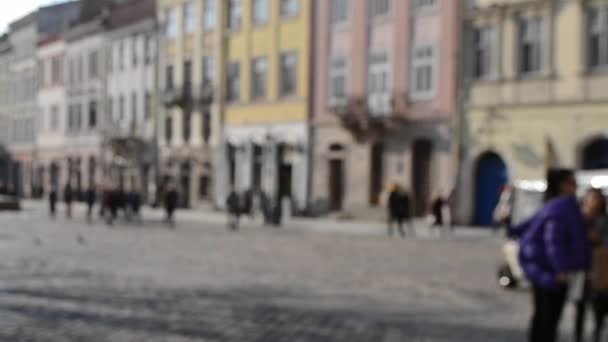 Blurred Background of many people on street square city town. — Stock Video