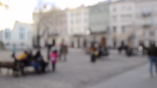 Abstrakt Defokussierter unscharfer Hintergrund vieler Menschen auf dem Marktplatz — Stockvideo