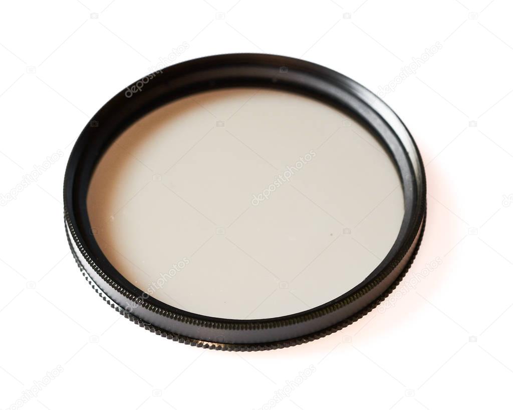 Polarizing lens filter isolated on white background