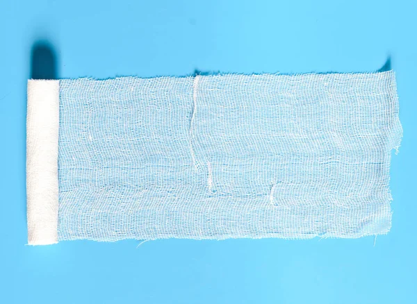 Medyczne bandaż, tekstury i tła. Kolor niebieski i biały. Ilość wolnego miejsca dla tekstu. — Zdjęcie stockowe