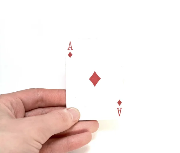 Ace of diamonds in a man's hand isolated on a white background — Stock Photo, Image