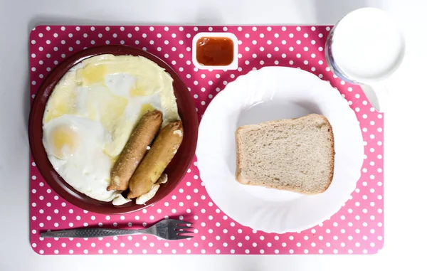 Breakfast: eggs, sauce, milk and bread — Stock Photo, Image