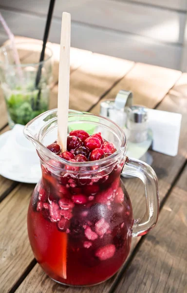 Fresh lemonade from cherry, barberry and raspberry — Stock Photo, Image