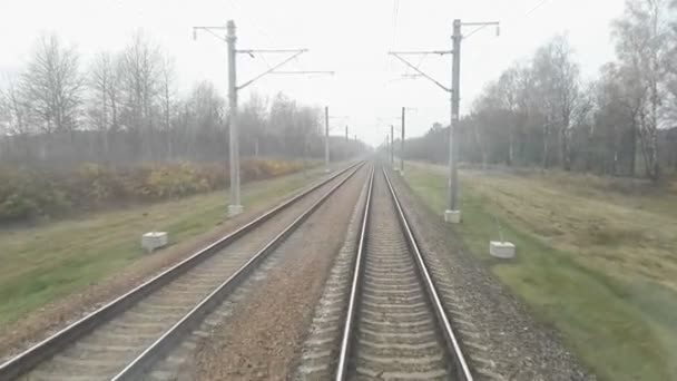 View from the train cabin to the railway — Stock Video