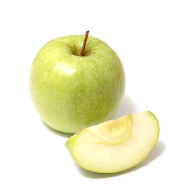 Yeşil elma ve üzerinde beyaz izole dilim