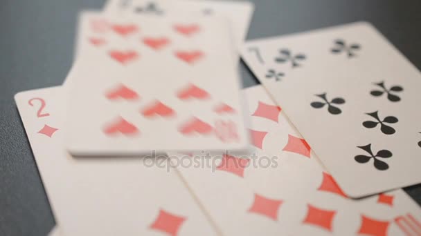 Dealing pack of playing cards close up — Stock Video