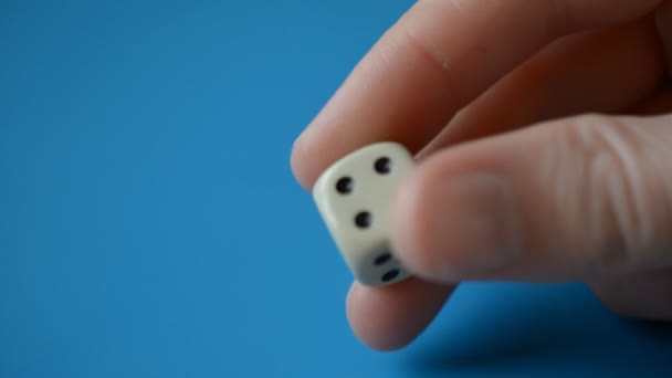 Man fingers Holding game dice close-up — Stock Video