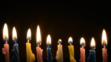 birthday celebration concept, candles for cake on black background