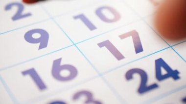Personal planning calendar highlighting number sixteen and seventeen red marker