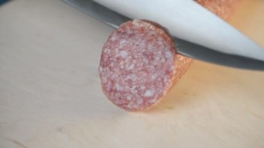 chef sliced sausages salami close