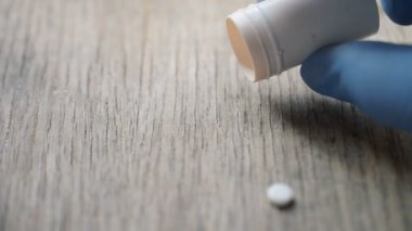 falling on the table, drugs and pharmaceutical capsules concept