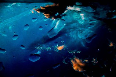 Camdaki bir damla suyun arkaplanı.