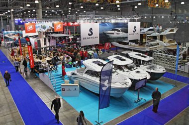 Moscow / Russia  03 05 2020: Beneteau motor boats on top view interior of 13th International Moscow Boat Show 2019 at the Crocus Expo exhibition center