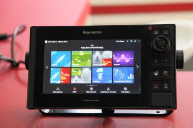 Moscow / Russia  03 05 2020: Motor boat multifunctional device Raymarine Hybridtouch screen close up on 13th International Moscow Boat Show 2020 at the Crocus Expo exhibition center