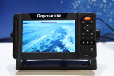 Moscow / Russia  03 05 2020: Motor boat multifunctional device Raymarine Element GPS Sonar screen close up on 13th International Moscow Boat Show 2020 at the Crocus Expo exhibition center