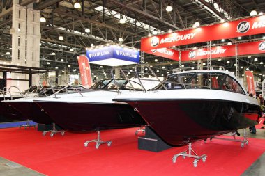 Moscow / Russia  03 05 2020: Russian motor boats Phoenix on stand Mercury on 13th International Moscow Boat Show 2020 at the Crocus Expo Yacht exhibition center