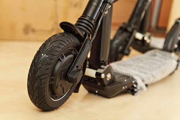 New compact electrical kick scooter motor wheel close up — Stock Image New Compact Electrical Kick Scooter Motor Wheel Close Royalty Free Stock Photos