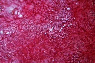 Kaynar jöle baloncukları kestane rengi yüzey, arkaplan dokusu