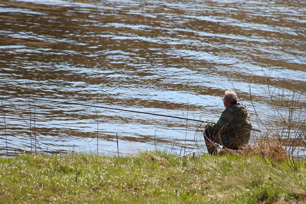 Fisherman Fishing Rod Sitting River Bank Spring Day Calm Outdoor — Stock Photo, Image