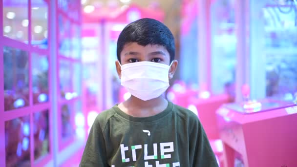 Little Asian Boy Wearing Mask Looking Camera Shopping Mall Health — Stock video