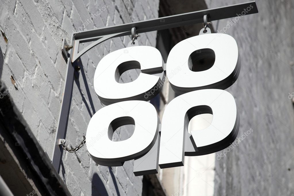 Carmarthen, UK, October 22, 2016 :  Co Op logo advertising sign outside one of its its retail supermarket stores in the city centre