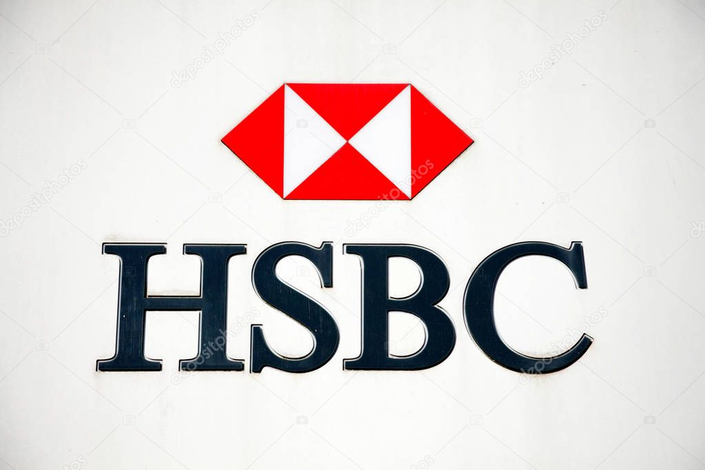 Carmarthen, Wales, UK, October 22, 2016 :  HSBC bank advertising sign outside their retail branch in Lammas Street