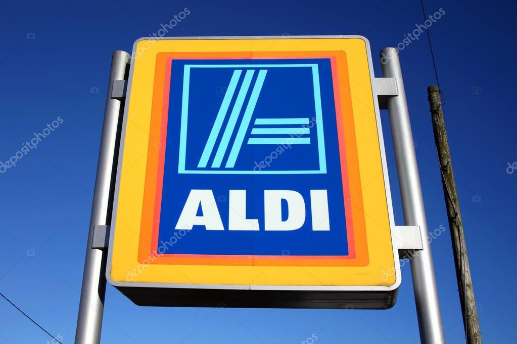 Carmarthen, Wales, UK  January 2, 2017:  Aldi logo advertising sign outside its retail supermarket stores in the city centre