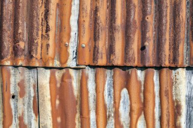 Sıkıntılı eski oluklu pas kaplı demir çit arka plan