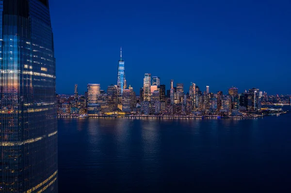 Aerial view of New York city Manhattan skyline from Jersey at dusk.