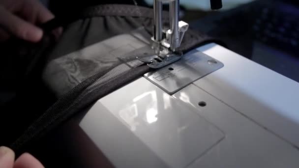 Female hands working on sewing machine close up — Stock Video